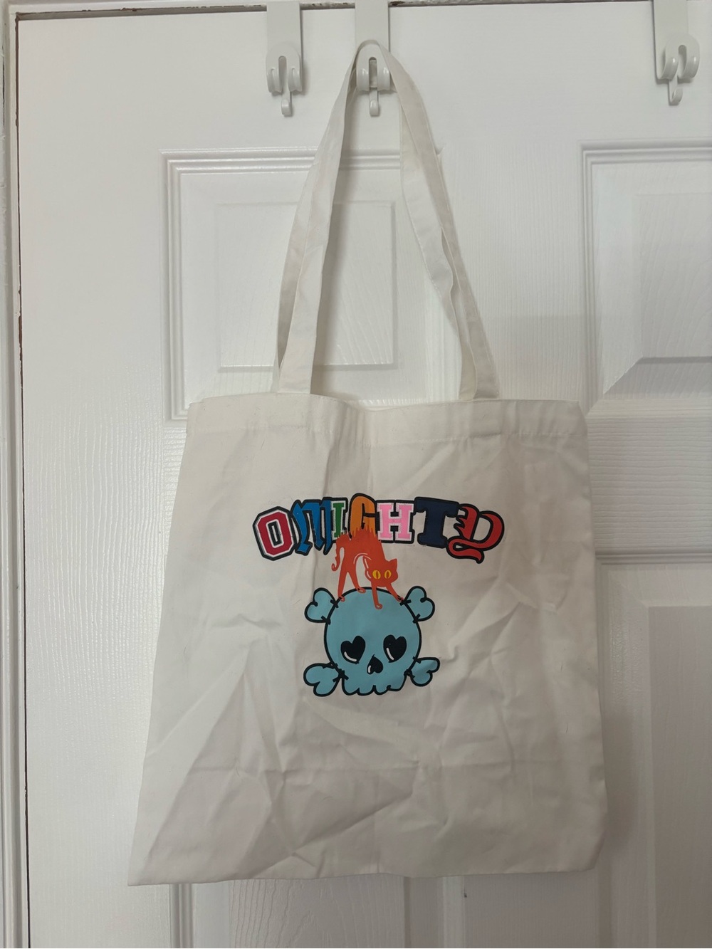 OMIGHTY White Graphic Tote Bag with Blue Skull and Orange Cat